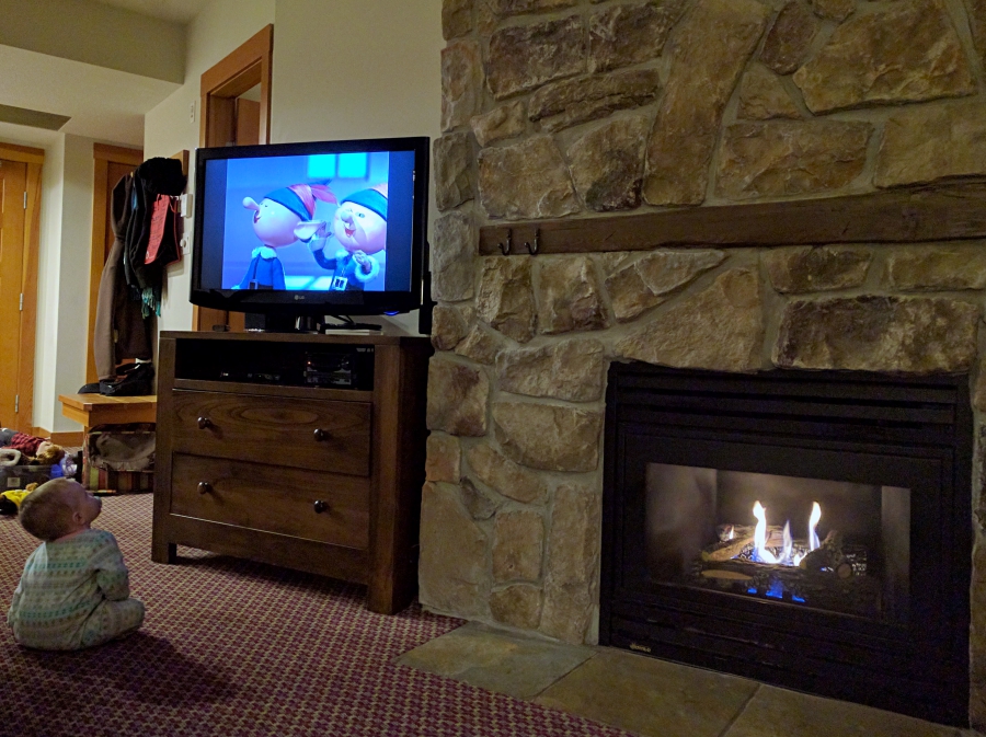 Watching movie in Legends Whistler hotel suite. 