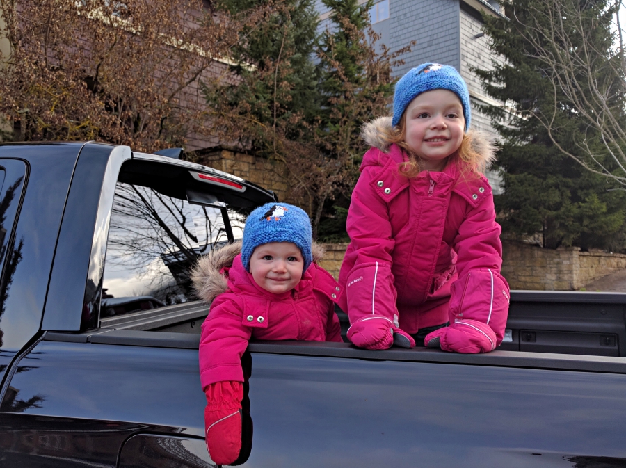 Our girls in truck bed while in Whistler Village 