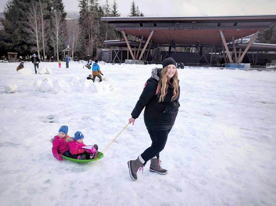 Pulling a sled in Whistler Olympic Plaza