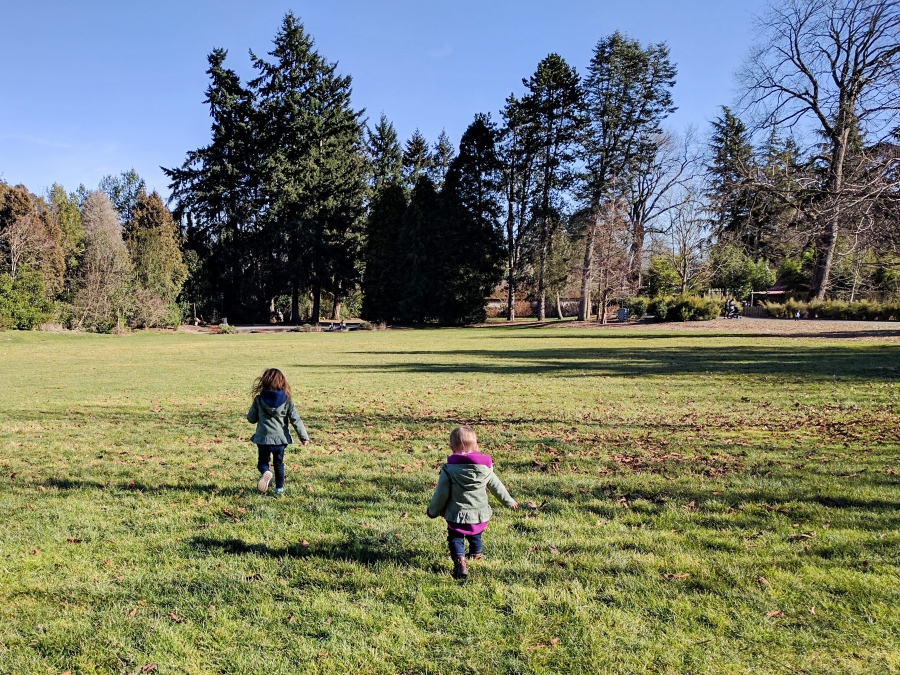 Family Day: Woodland Park Zoo, running in some open green space at the zoo