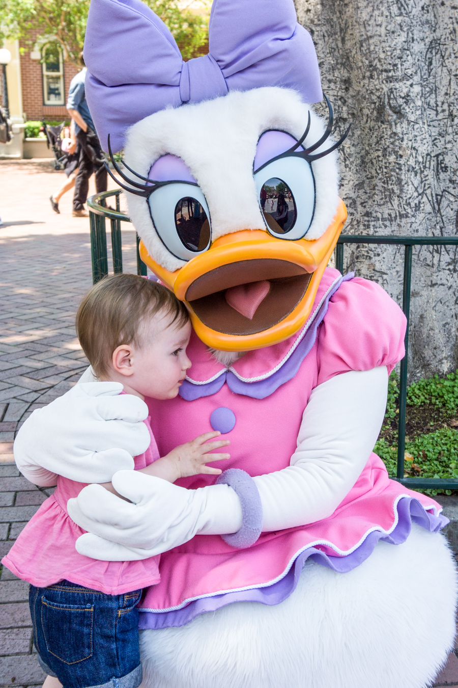 Going to Disneyland with a toddler. Meeting characters. Daisy Duck.